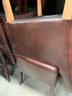 Brown leather tub chairs