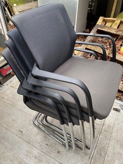 Stacking office chairs with arms