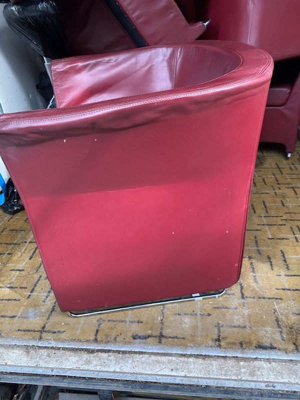 Blood red leather tub chairs