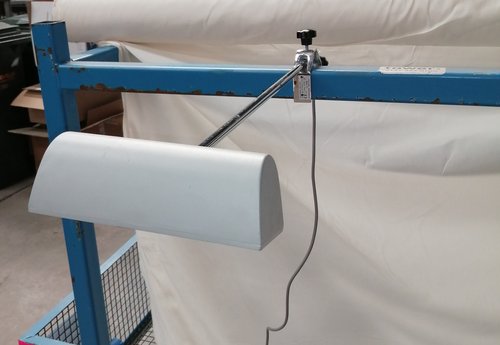 Exhibition lighting on a long arm Exhibition lighting on a long arm