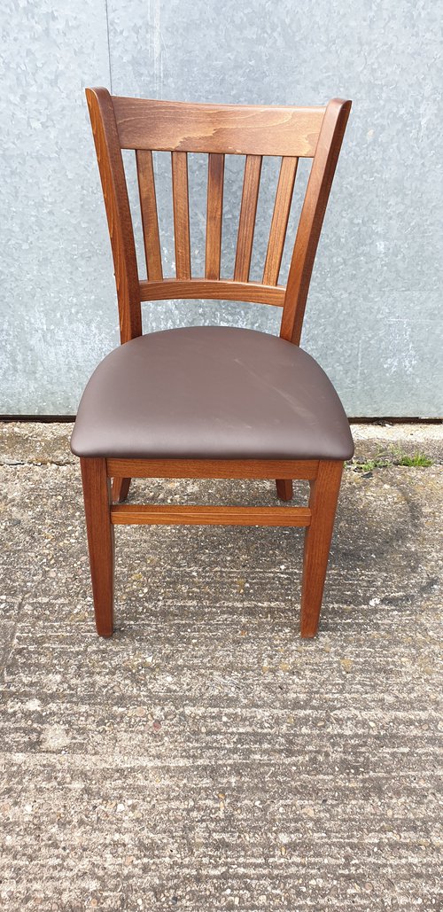 Houston chairs finished in Walnut stain and Brown faux leather seat Houston chairs finished in Walnut stain and Brown faux leather seat