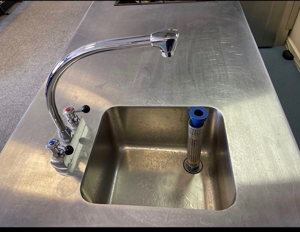 Single sink with taps