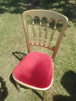 Gold Cheltenham chair with red seat pads