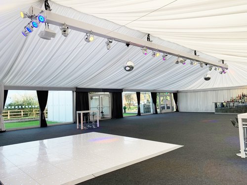 Truss with lighting in a event marquee Truss with lighting in a event marquee