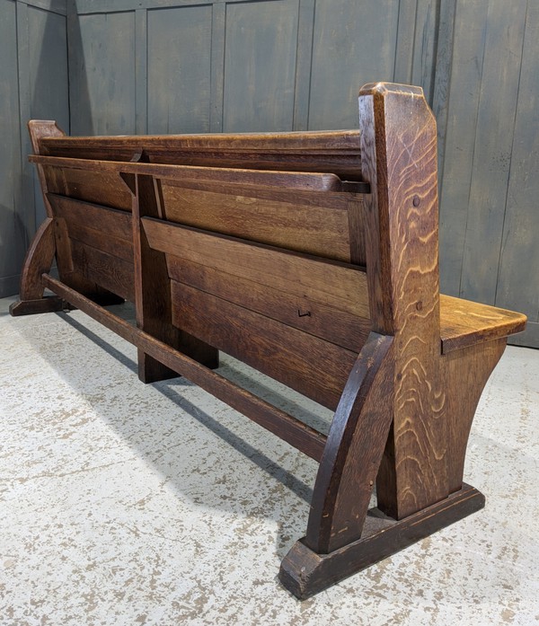 Antique church pew with bible chelf