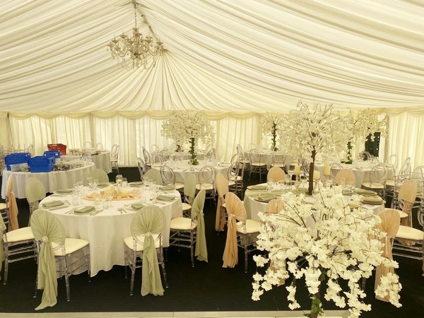 Marquee set out for a summer wedding