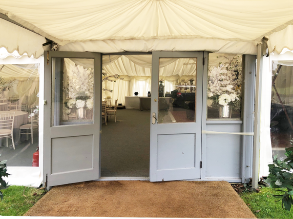 Double door entrance to the marquee