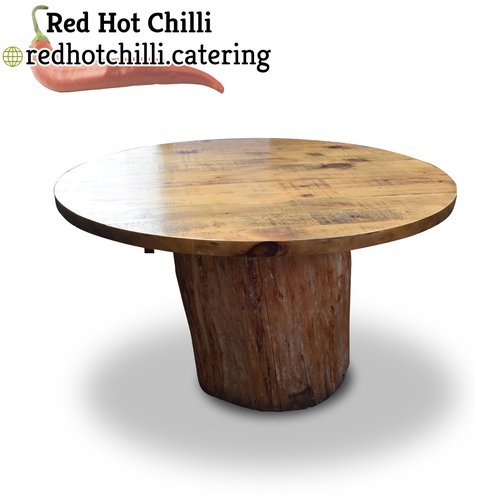 Table with tree stump base Table with tree stump base