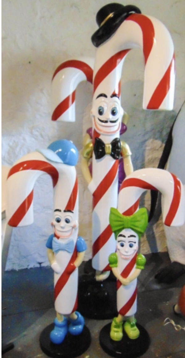 Candy cane walking sticks with faces