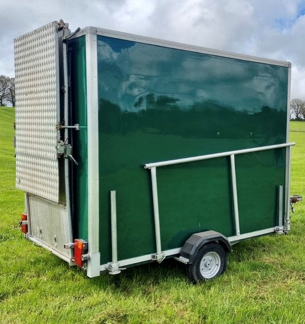 Folding disabled ramp on the back of a toilet trailer