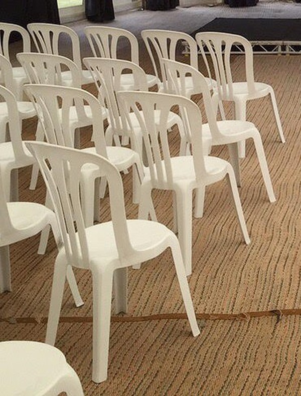 Used white plastic bistro chairs