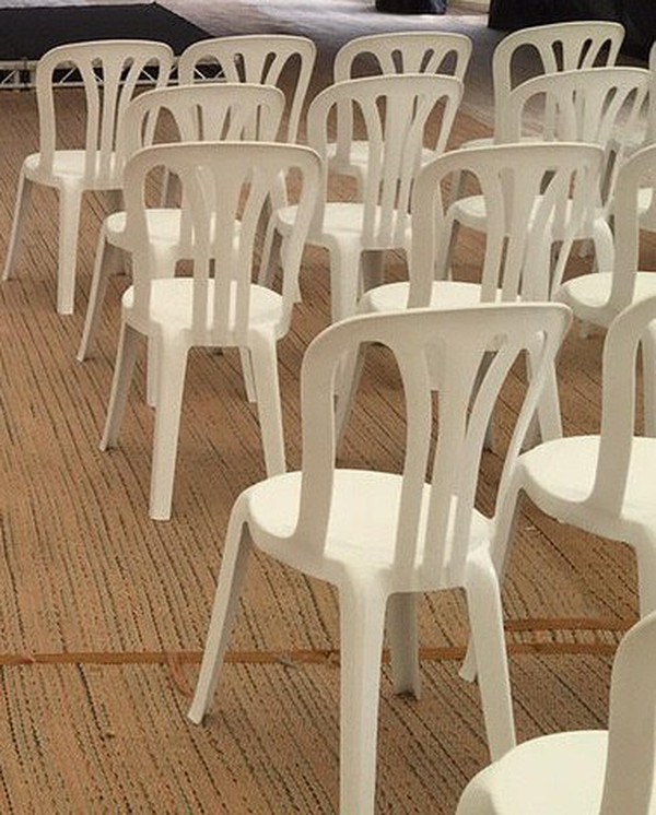 White stacking bistro chairs