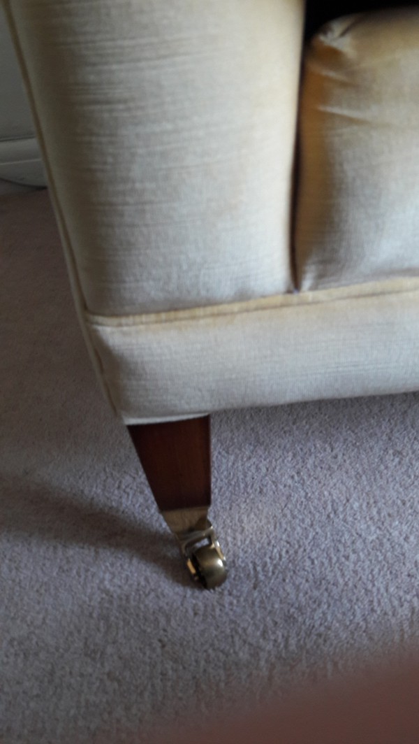 Sofa leg with castor