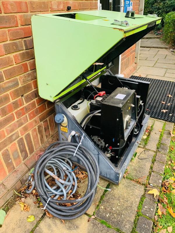 Standby generator in an sound deadening enclosure