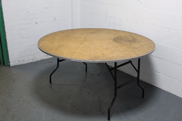 6Ft Round table with folding legs for sale