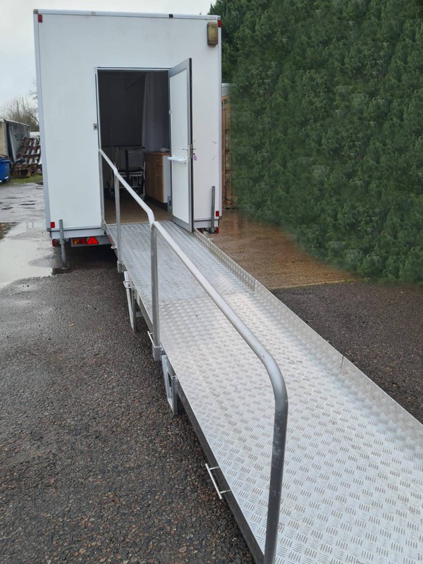 Disabled toilet with aluminum access ramp