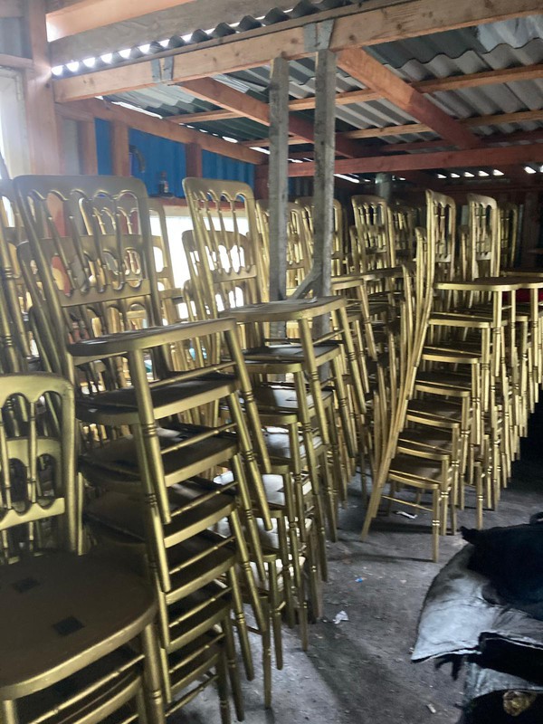 Stacking gold banqueting chairs