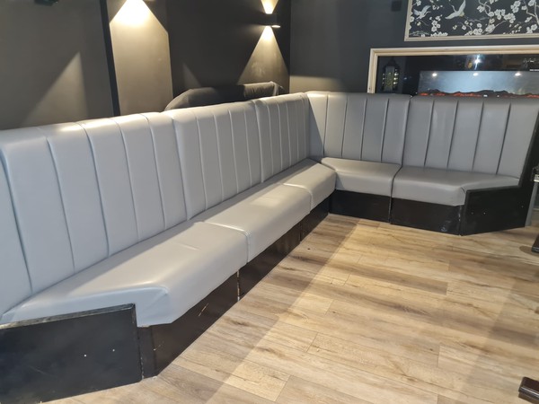 Grey leather pub bench seating