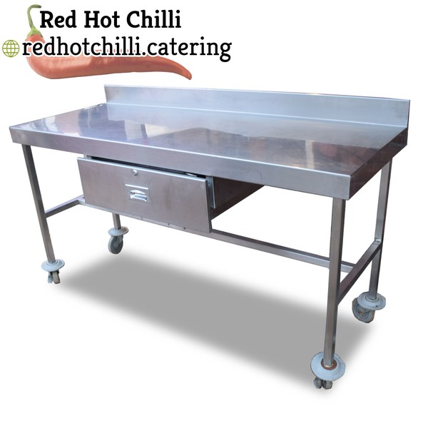 Stainless steel table on wheels with drawer