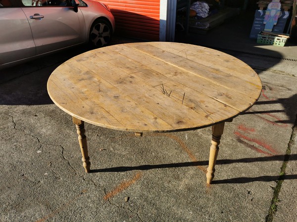 Plank top table with folding legs