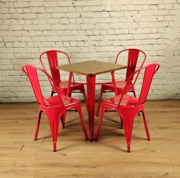 Red cafe tables and chairs by Tolix