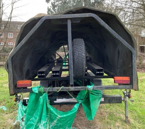 Climbing wall trailer with spare tyre
