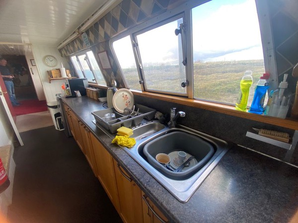 Galley kitchen with fantastic views