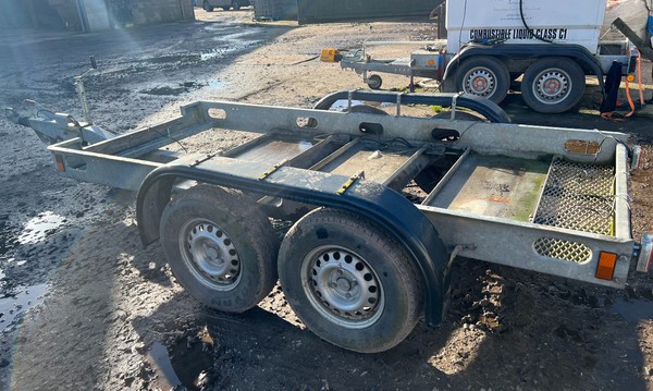 Twin axel trailer for a generator