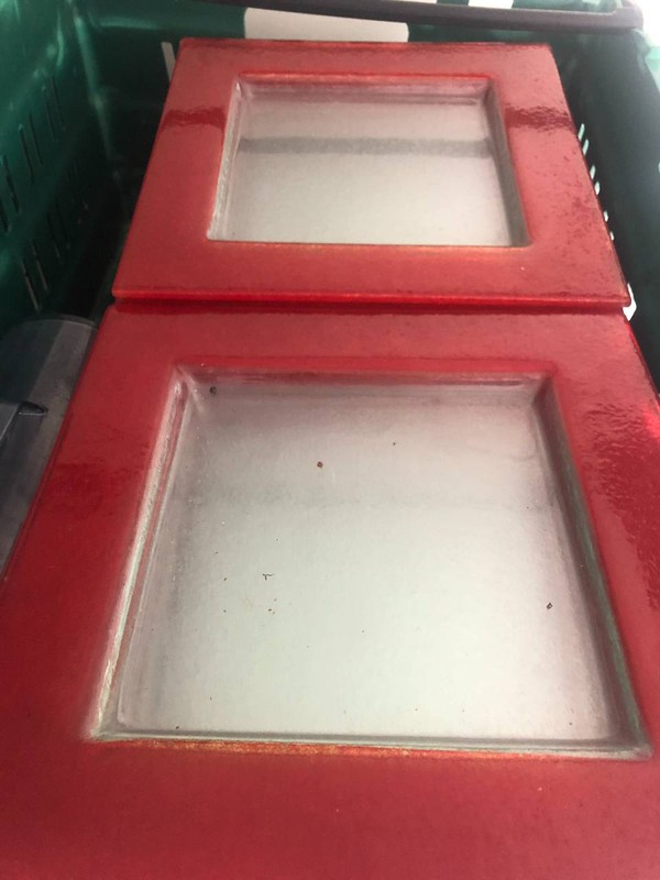 Square glass plates with red boarders