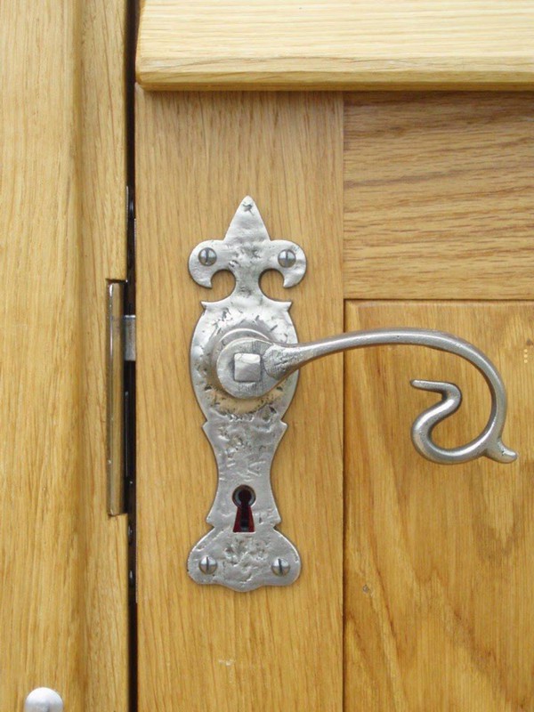 Oak door with ornate door handle