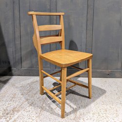 Church chair with bible shelf