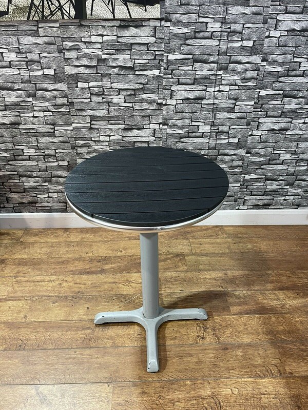 Brand New Stunning 60cm round Black Resin And Aluminium Table With Cast Iron Base For Sale