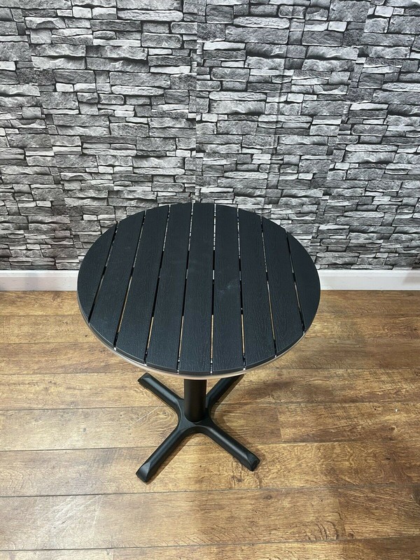 Stunning 60cm round Black Resin And Aluminium Table With Cast Iron Base For Sale