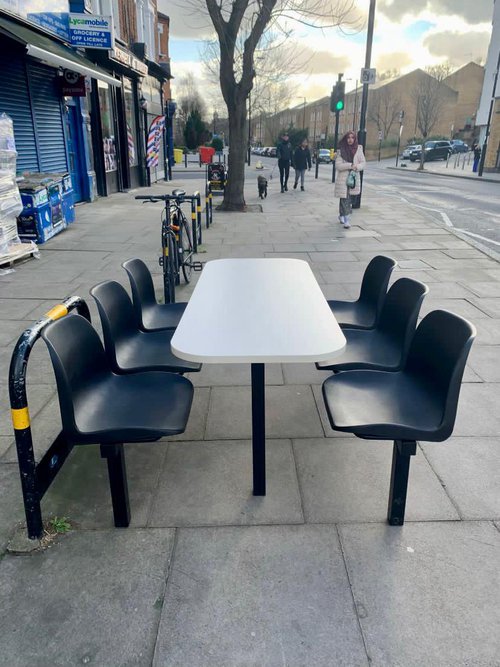 Fixed cafe table with six chairs Fixed cafe table with six chairs