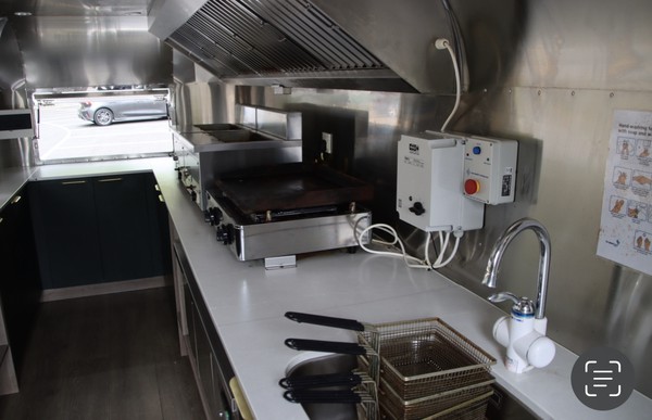Catering trailer with extraction canopy