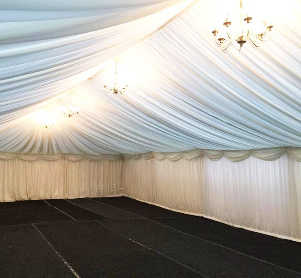 Ivory marquee lining with hip ends