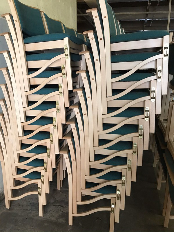 Stacking wooden church chairs for sale