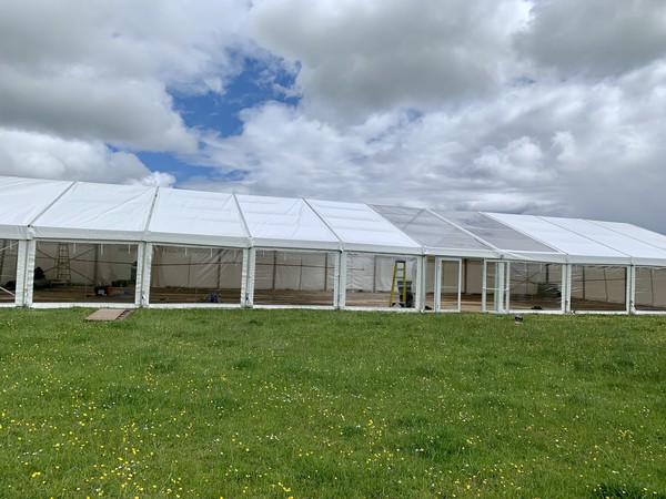 12m framed marquee with panoramic windows and doors