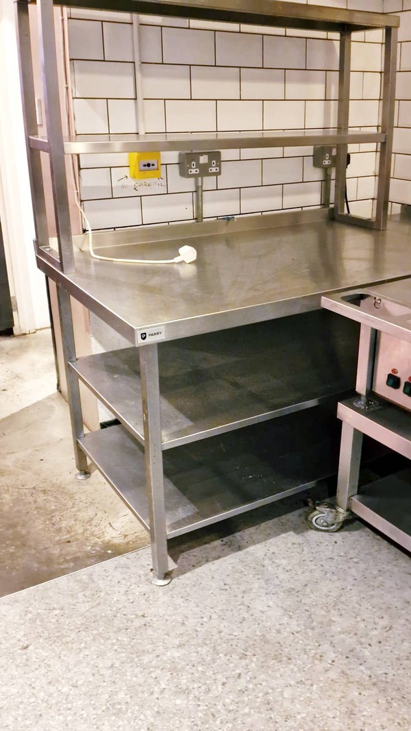 Stainless steel prep table with shelves