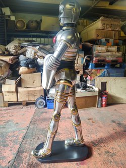Metallic silver and gold robot