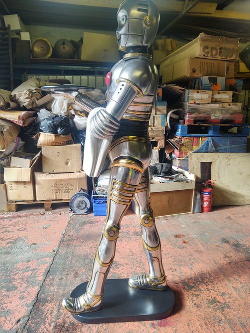 Metallic silver and gold robot Metallic silver and gold robot