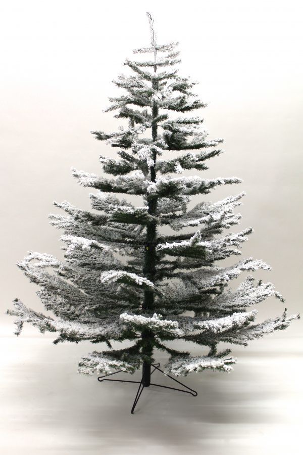 Snow covered christmas tree for sale