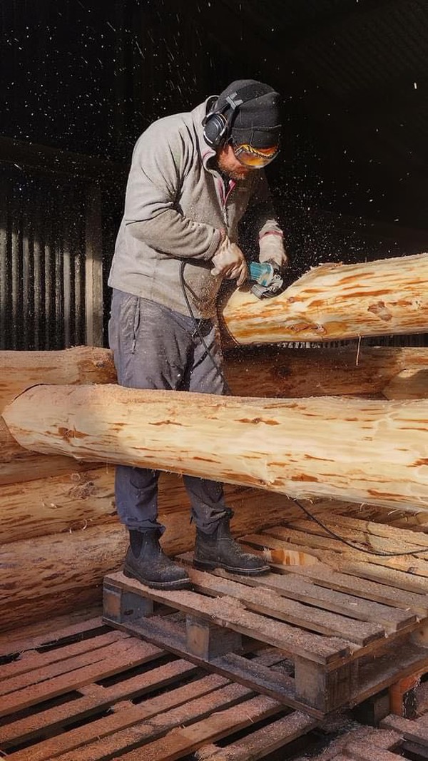 Hand made round wood log cabin
