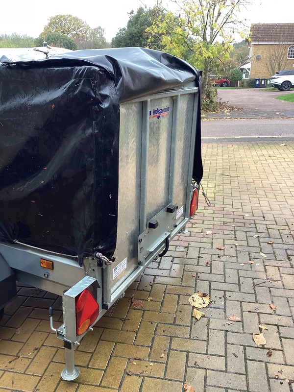 Covered trailer with ramp