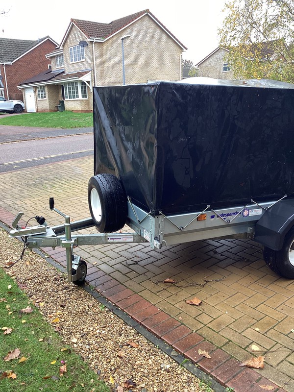 Trailer with ramp and cover