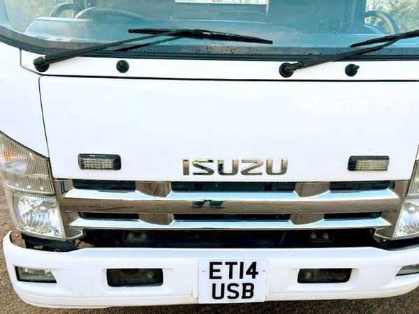Isuzu Forward flat bed lorry with tail lift for sale