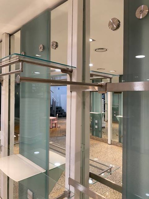 Mirrored wall fittings for clothes and jewellery