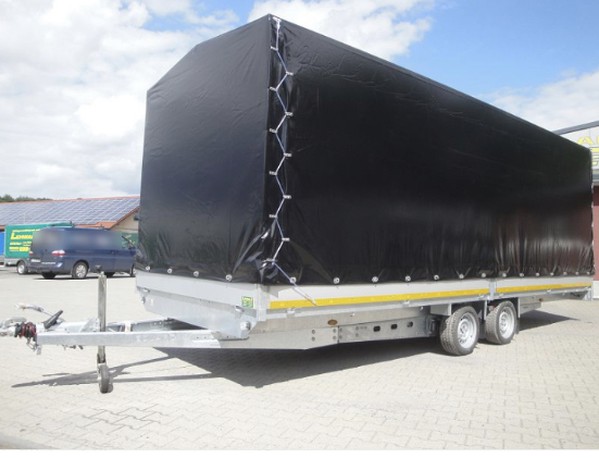 Drop side trailer with curtain sides