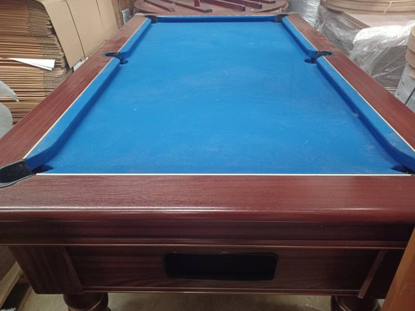 Dark wood and blue baize pool table