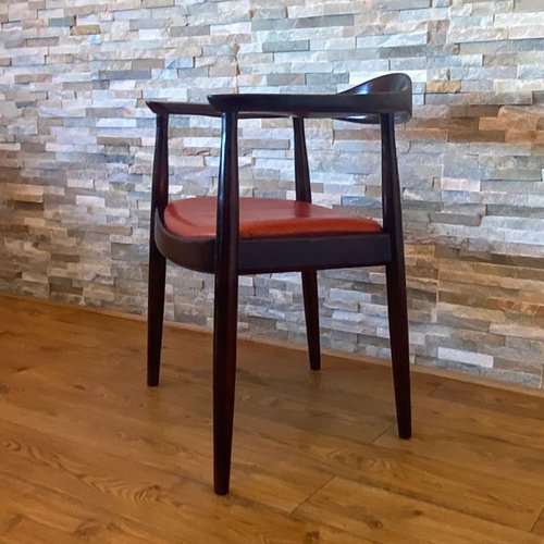 Retro Vintage Real Orange Leather Chair seated on a Dark Oak Frame Retro Vintage Real Orange Leather Chair seated on a Dark Oak Frame